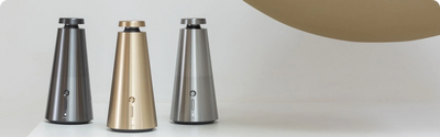 ISCENT Ensō diffusers in graphite, gold and silver on a marble counter